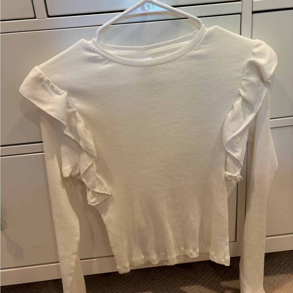White Zara long sleeve top with ruffle sleeves. Size: 14 years